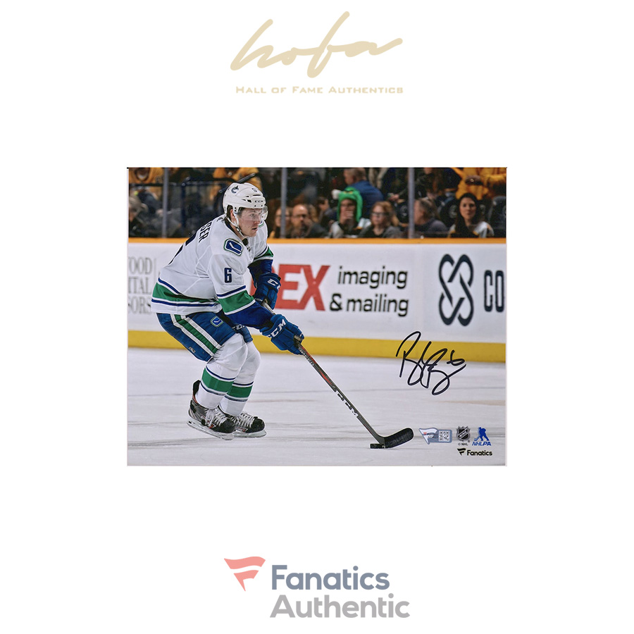 Brock_Boeser_Vancouver_Canucks_Autographed_8_x_10_White_Jersey_Skating_with_Puck_Photograph_3729955_1.jpg