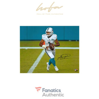 Tua Tagovailoa Miami Dolphins Autographed 16" x 20" White Jersey Rolling Out Photograph