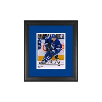 John Tavares Toronto Maple Leafs Framed Autographed 8" x 10" Blue Jersey Skating with Puck Photograph