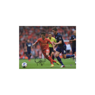Philippe Coutinho Liverpool Autographed 12" x 16" Dribbling vs. Manchester United Photograph