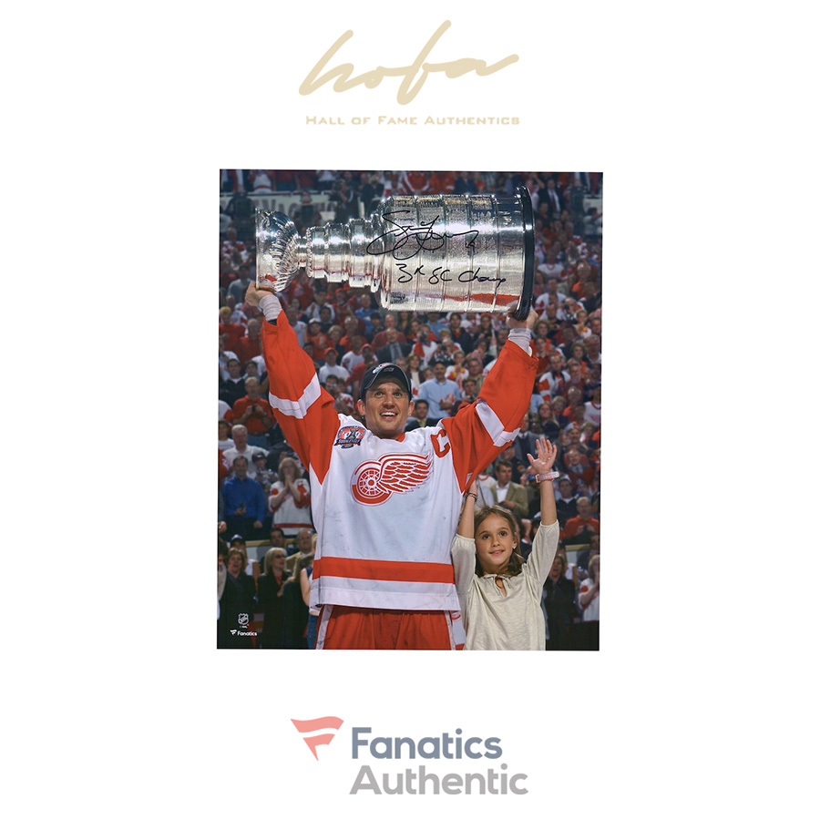 steve_yzerman_detroit_red_wings_autographed_16_x_20_raising_cup_photograph_with_3x_sc_champ_inscription_4398678_1.jpg